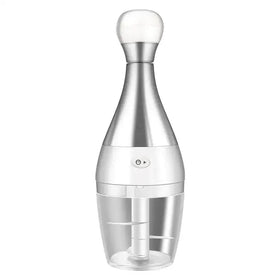 Silver and white electric food chopper with a transparent bowl, sleek metallic body, and rounded handle.