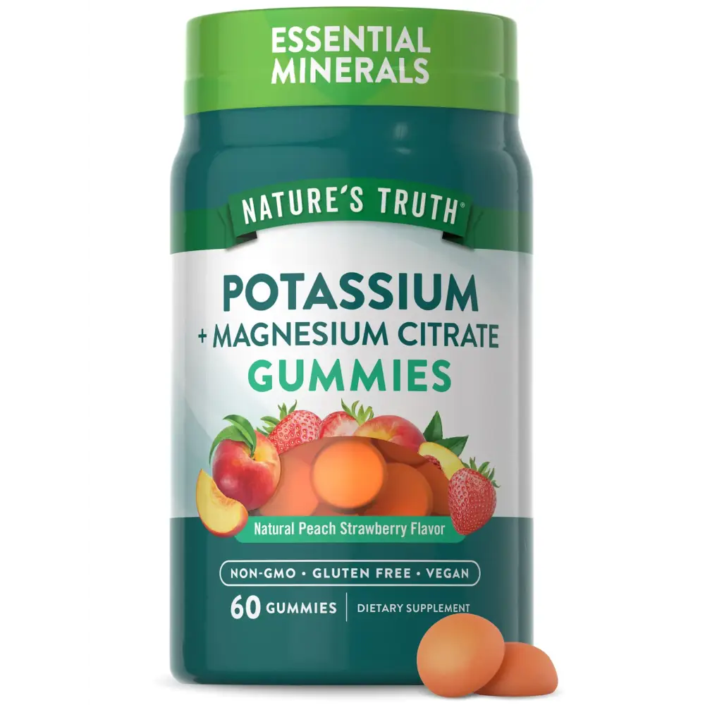 Green and white labeled bottle of nature’s truth potassium + magnesium citrate gummies in natural peach strawberry flavor.