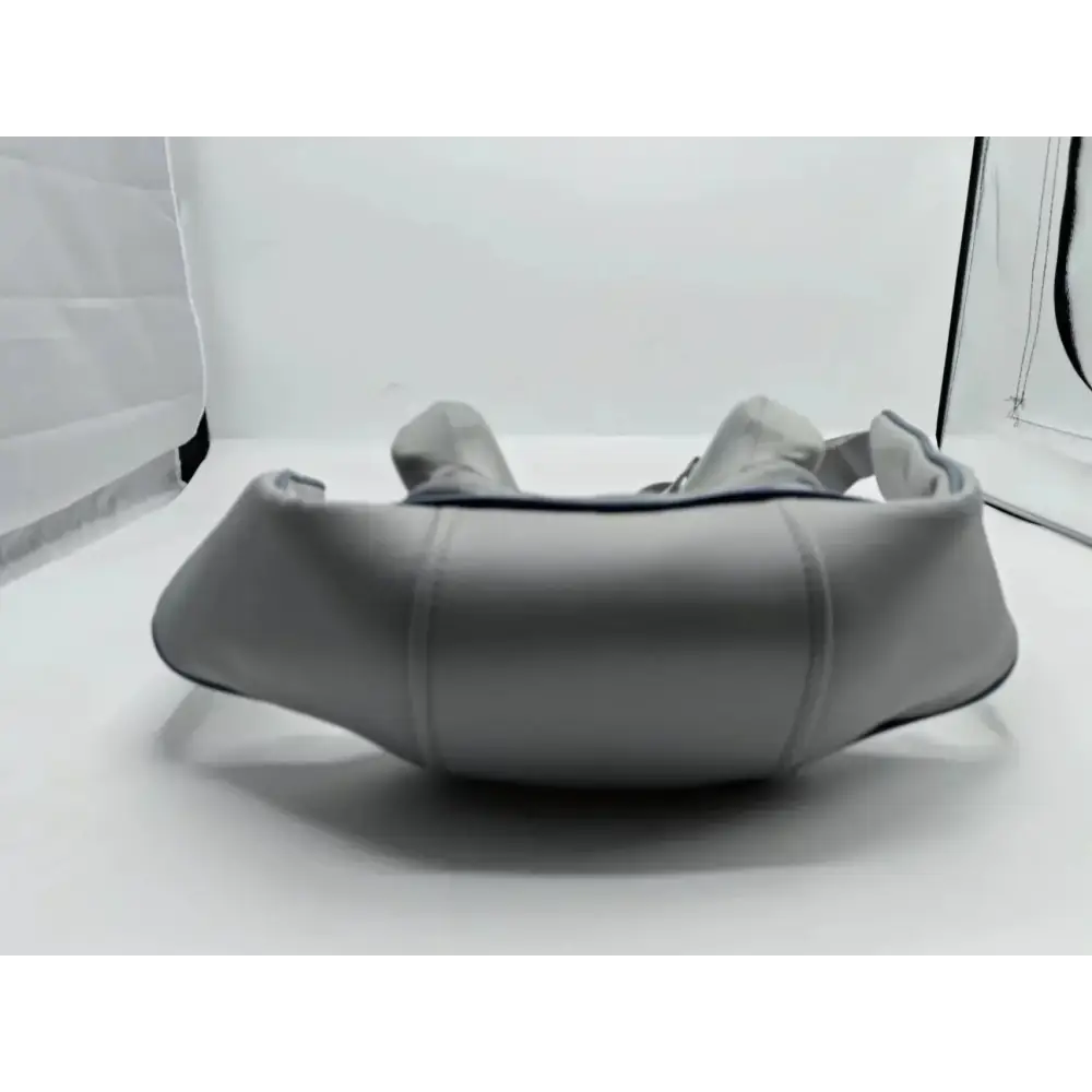 Gray leather belt bag with a sleek, minimalist design and subtle stitching details.