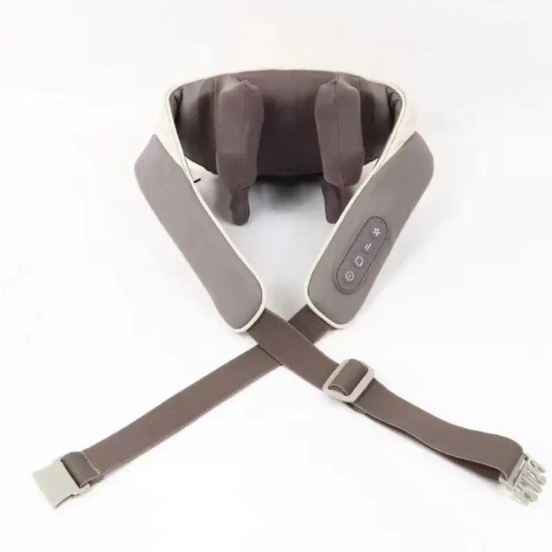 Gray and beige electric neck massager with padded shoulder straps and control buttons.