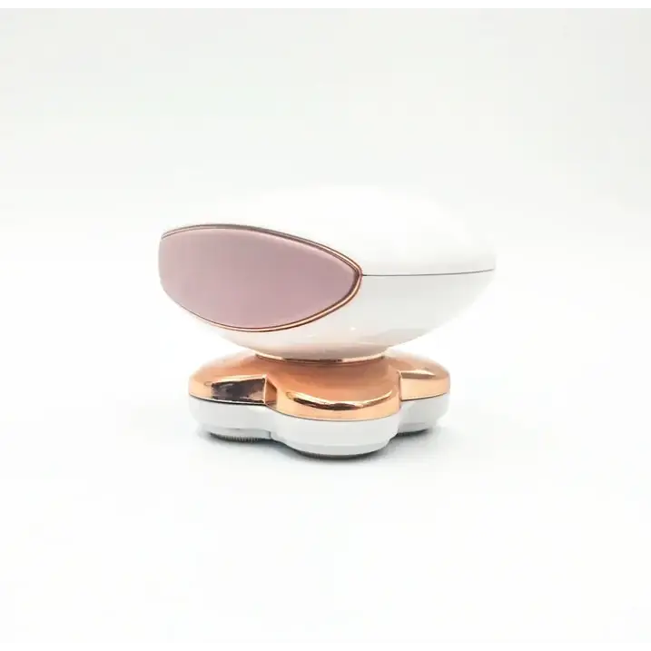 A sleek, modern electric razor with a white and rose gold finish.