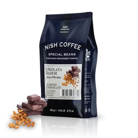 A dark blue bag of nish coffee special beans, almond chocolate flavored ground coffee.