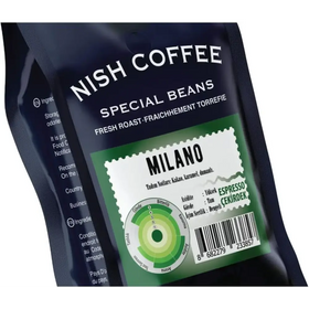 Dark blue bag of nish coffee special beans, featuring a green and white label with ’milano’ prominently displayed.