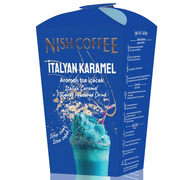 Nish coffee italian caramel flavored powdered drink in a vibrant blue box with gold accents and an image of a teal-colored beverage topped with whipped cream.