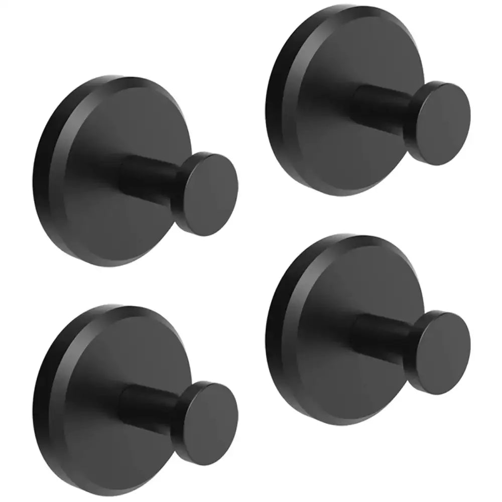 Set of four sleek black matte-finished wall-mounted hooks with circular heads and cylindrical pegs.