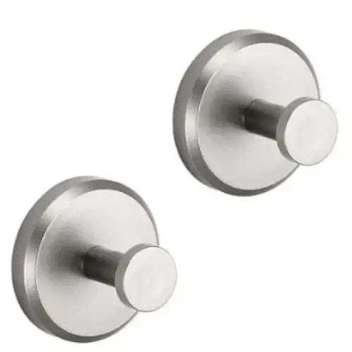 Stainless steel wall-mounted hooks with a sleek, circular design and polished finish.