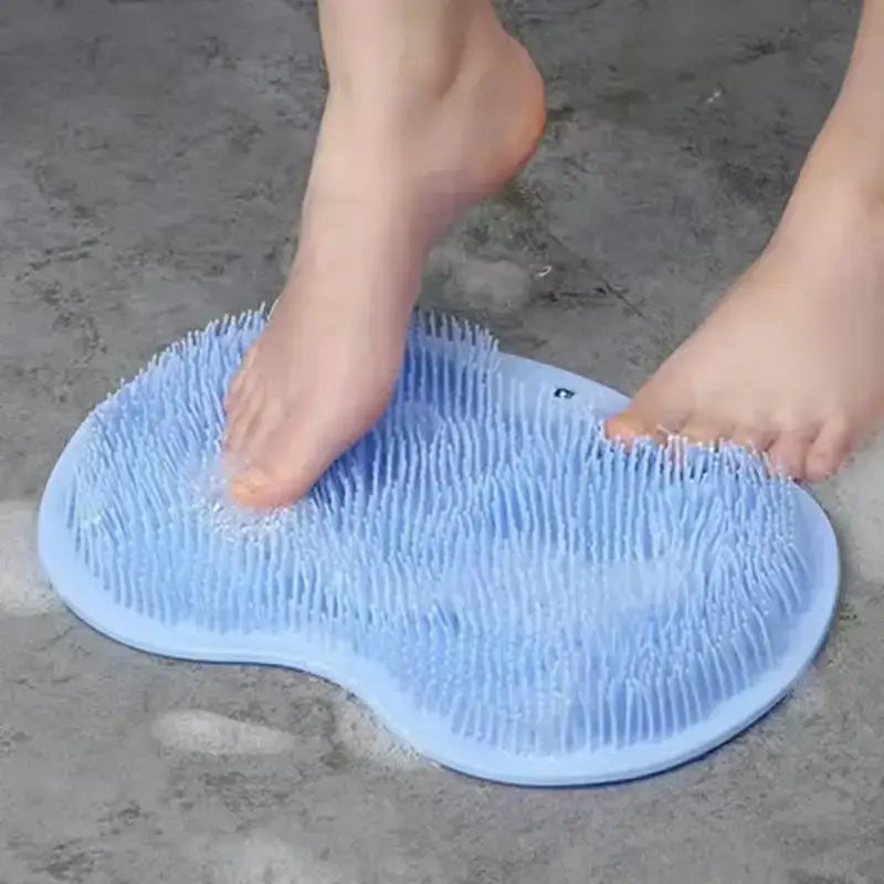 Light blue silicone foot massage mat with soft, flexible bristles.