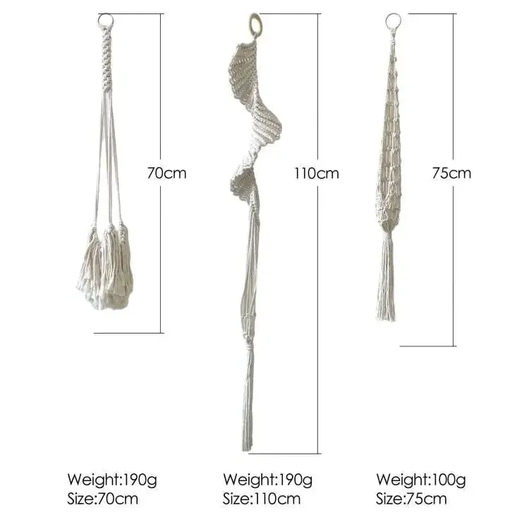 Three macrame plant hangers in off-white, crafted from woven rope with tassels and varying lengths.