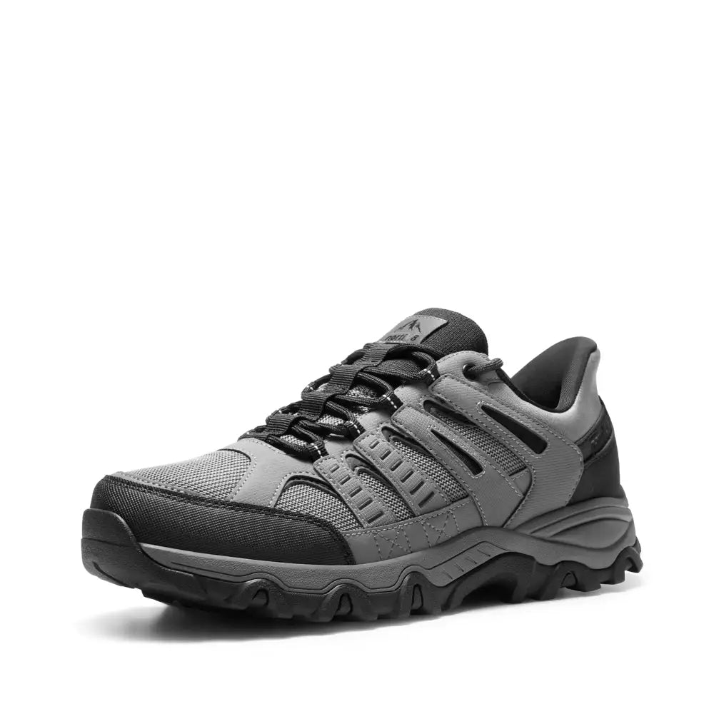 Gray and black hiking shoe with a rugged, textured sole and breathable mesh upper.