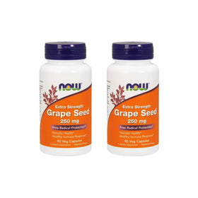 Two white plastic bottles with orange labels and dark purple caps, each labeled ’now extra strength grape seed 250 mg’ for dietary supplement use.