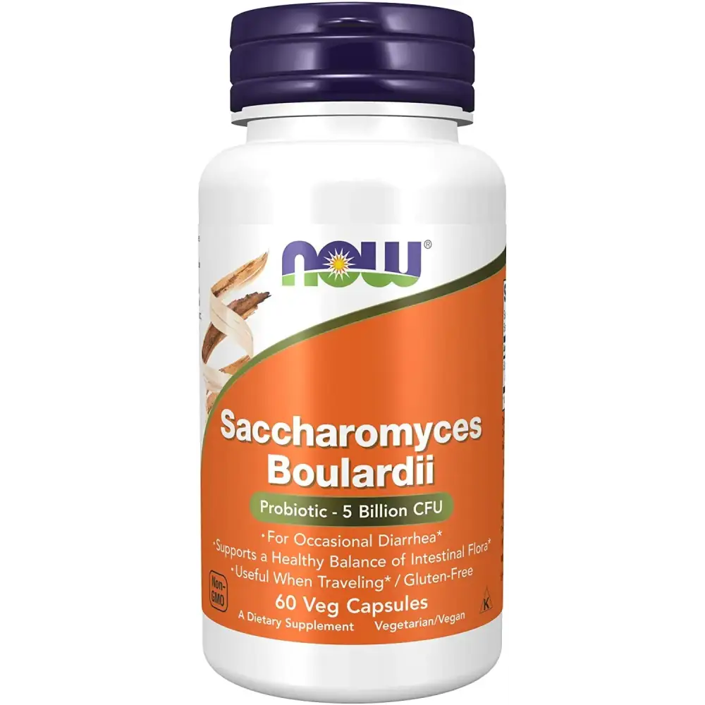 White plastic bottle with a purple cap and an orange label featuring the now brand name, displaying saccharomyces boulardii probiotic capsules.