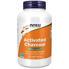 White plastic bottle with a purple cap and an orange label featuring the now brand name, labeled ’activated charcoal’ for detox support.