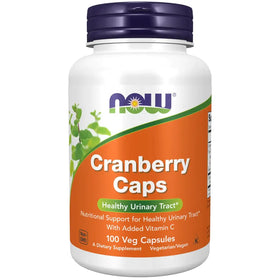 White plastic bottle with a purple cap and an orange label featuring the ’now’ brand name, displaying ’cranberry caps’ as its product.
