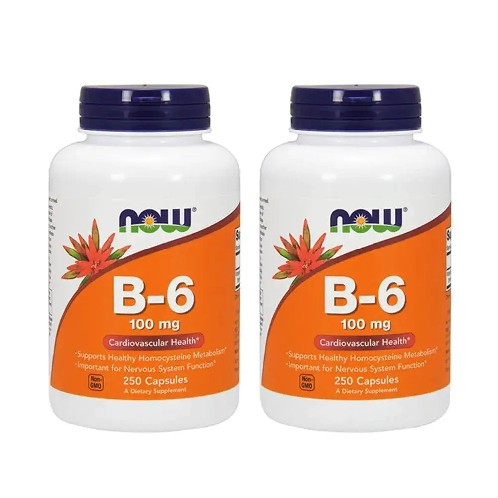 Two white plastic bottles with orange labels and dark blue caps, each labeled ’now b-6 100 mg’ for cardiovascular health.