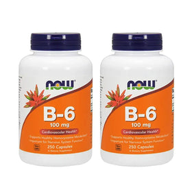 Two white plastic bottles with orange labels and dark blue caps, each labeled ’now b-6 100 mg’ for cardiovascular health.