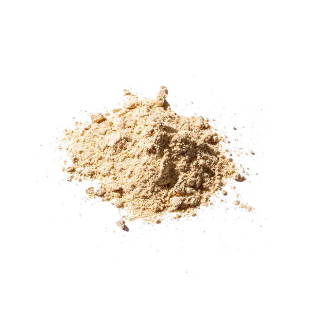 A mound of fine, light beige powder with a slightly granular texture.