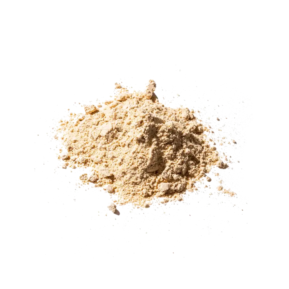 A mound of fine, light beige powder with a slightly granular texture.