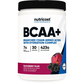 White plastic container with black lid and label featuring ’bcaa+’ branding, a blackberry plum flavor illustration, and nutritional information for a dietary supplement.
