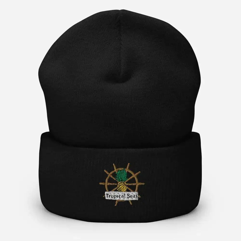 Black knit beanie with a embroidered pineapple and ship wheel design.