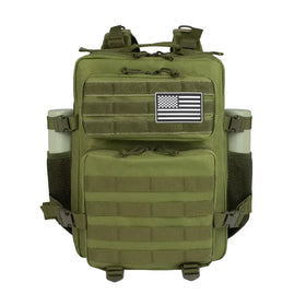 Olive green tactical backpack with black webbing straps and a white american flag patch on the front.