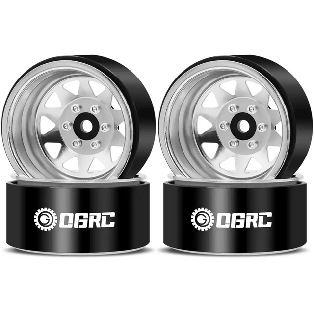 Black and silver rc truck wheels with a five-spoke design, featuring a shiny metallic finish on the rims.