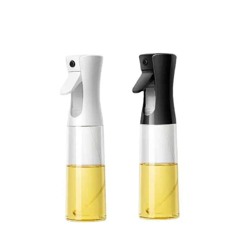Two sleek spray bottles, one white and one black, each with a transparent body filled with golden-yellow liquid.