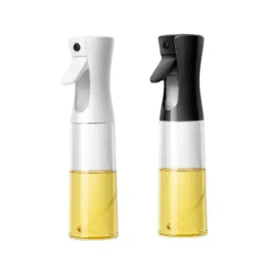 Two spray bottles, one white and one black, each with a clear lower section filled with yellow liquid.