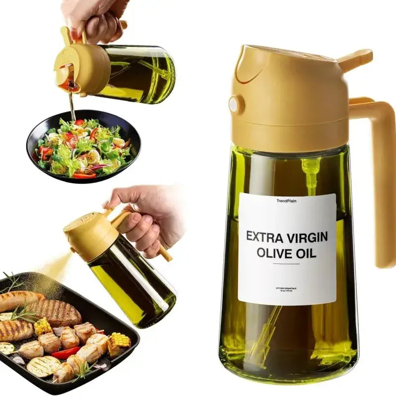 A sleek, transparent glass dispenser with a golden-yellow plastic lid and handle, labeled ’extra virgin olive oil’ by trendplain.