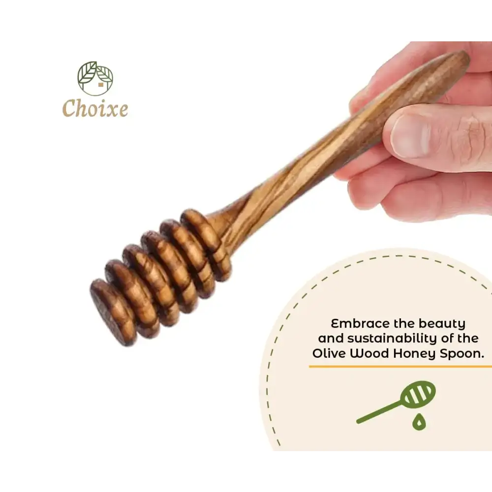 Handcrafted olive wood honey spoon with a natural, warm brown finish and distinctive swirling grain pattern.