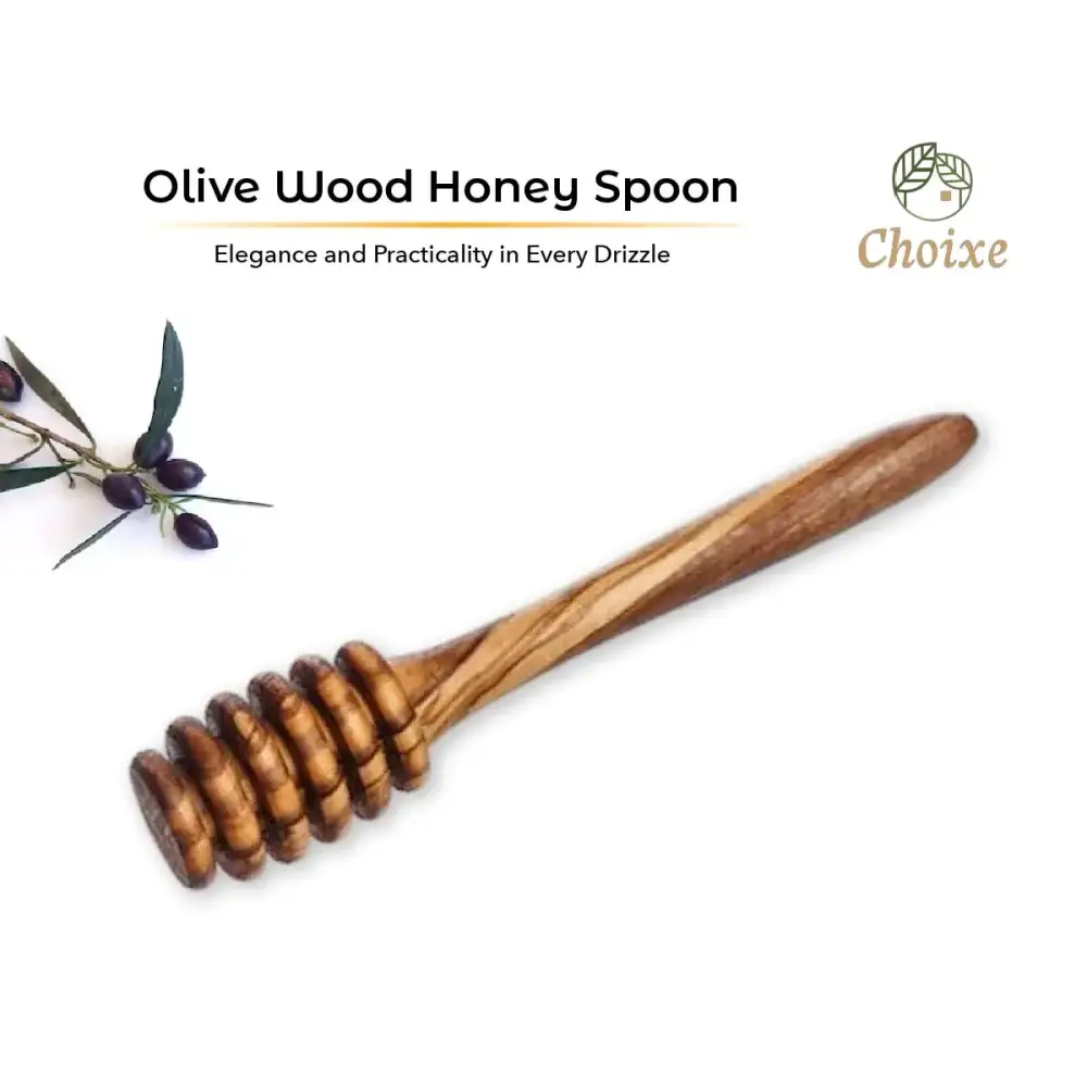 A handcrafted olive wood honey spoon with a natural, warm brown finish and distinctive swirling grain patterns.
