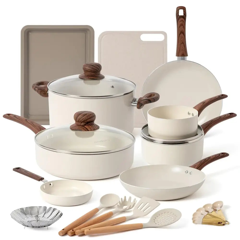 Cream-colored nonstick cookware set with wooden handles and glass lids.