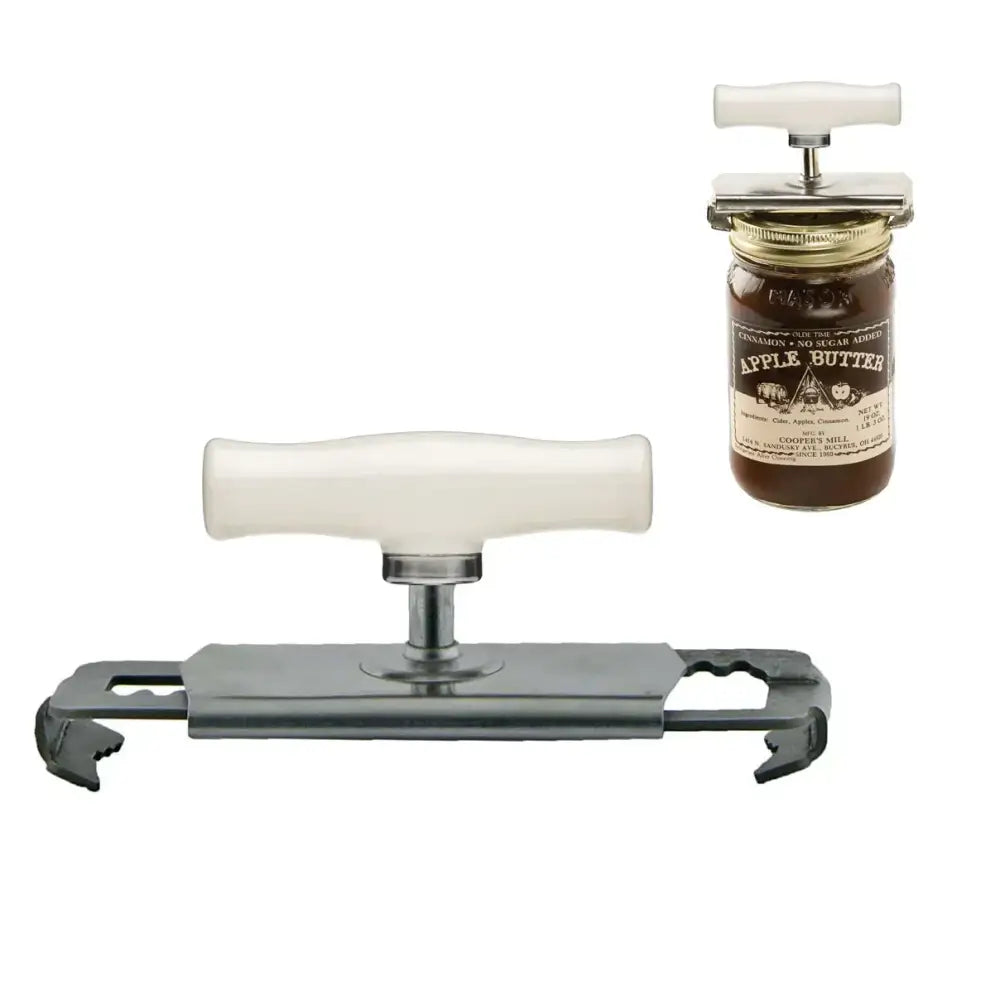 White-handled can opener with metallic body and serrated jaws, designed for opening jars like the one shown beside it.
