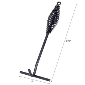 Black metal grill tool with a coiled spring handle and t-shaped end.