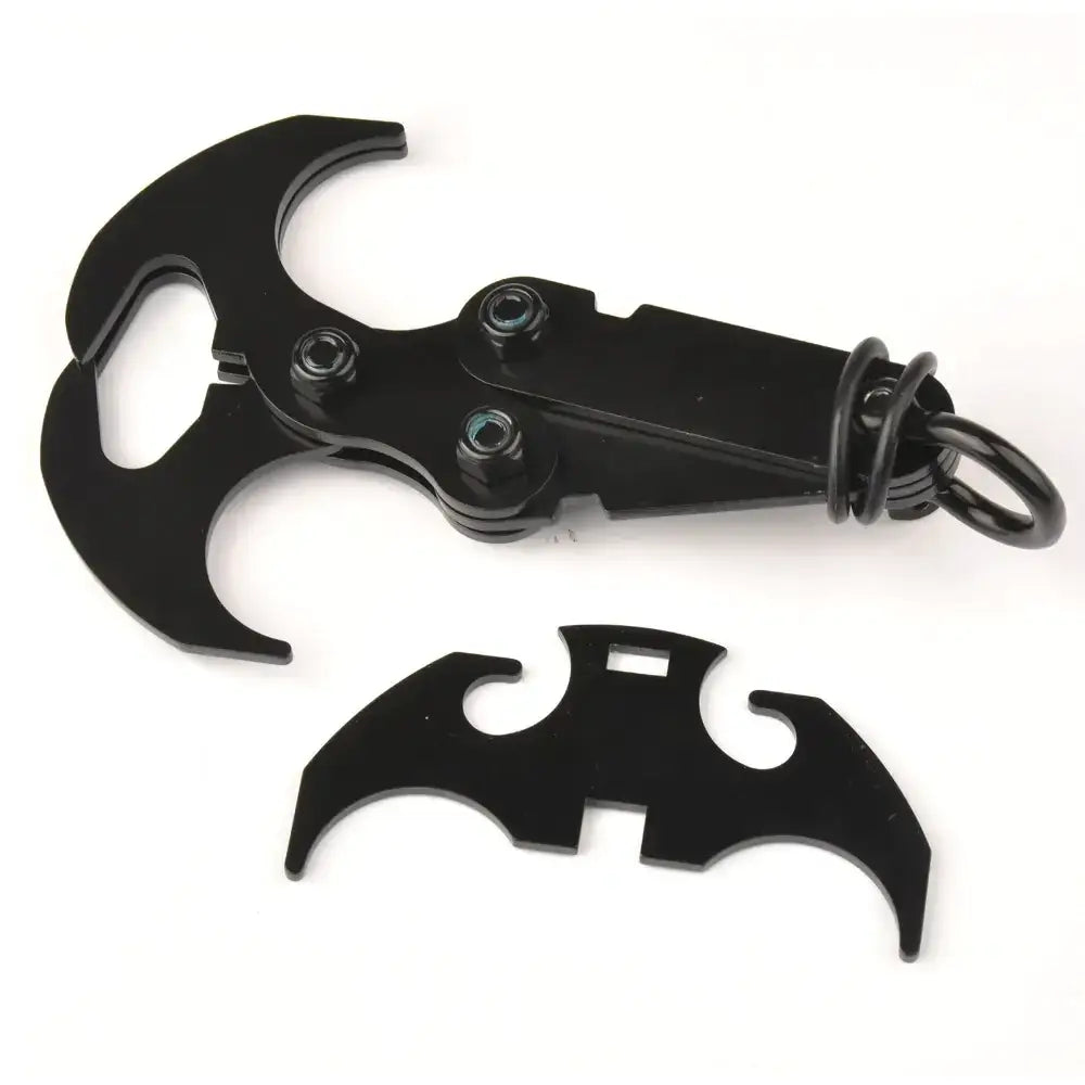 Black batman-themed multi-tool keychain with a sleek, metallic finish and integrated bottle opener design.