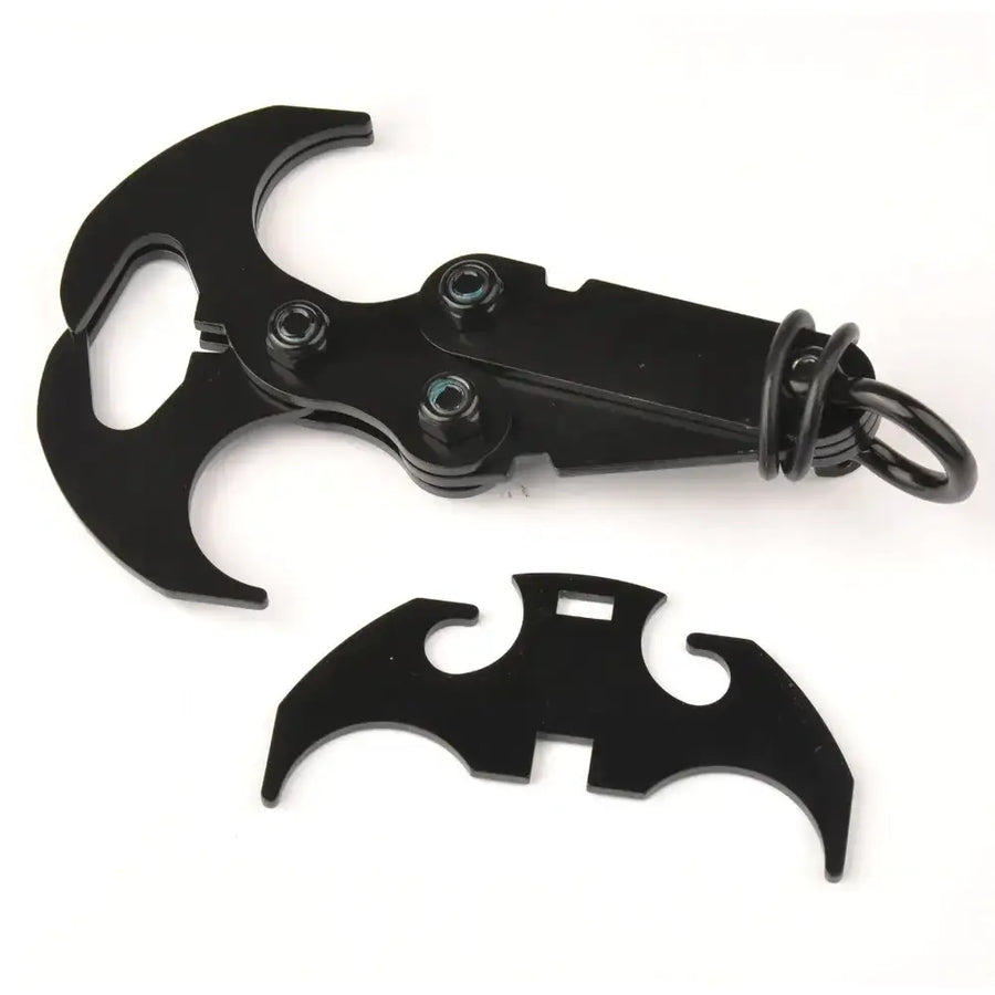 Black batman-themed multi-tool keychain with a sleek, metallic finish and integrated bottle opener design.