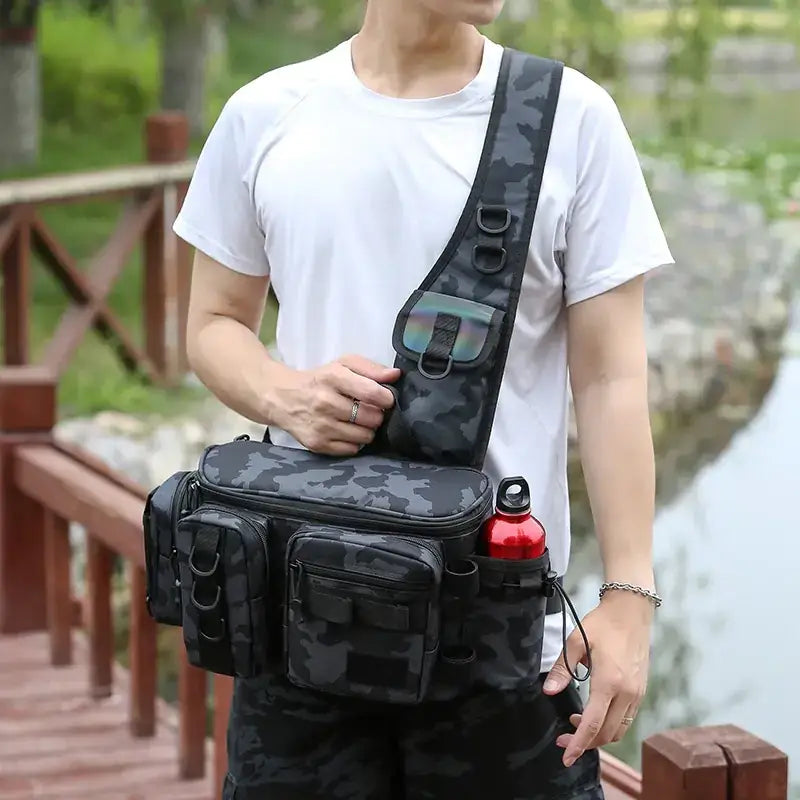 Black camouflage tactical crossbody bag with multiple pockets and a water bottle holder.