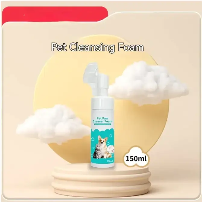 White plastic bottle with a pump dispenser, labeled ’pet paw cleaner foam’ and featuring an illustration of a dog and cat on its teal label.