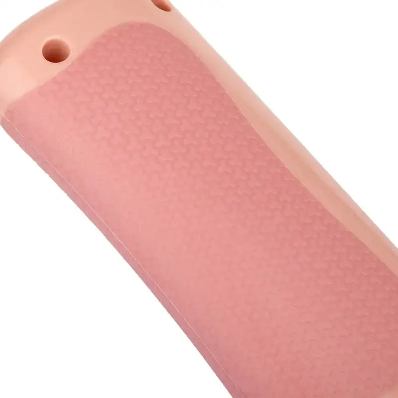 Pink silicone phone case with a textured, honeycomb-like grip pattern.