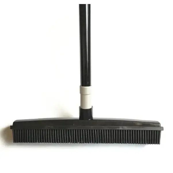 Black plastic squeegee with a long handle and dense, bristle-like rubber edge.