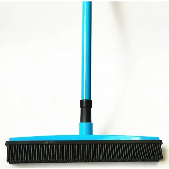 Blue plastic floor brush with black bristles.