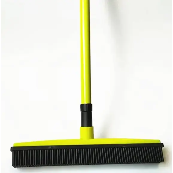 Bright yellow floor brush with a black rubber bristle head and a matching handle.