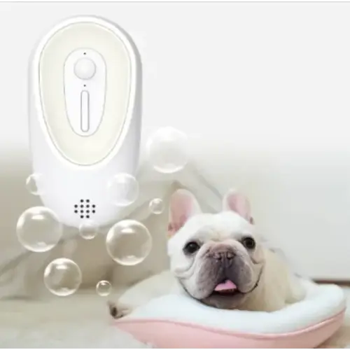 White oval-shaped pet collar with a central button and speaker grille, designed for comfort and functionality.