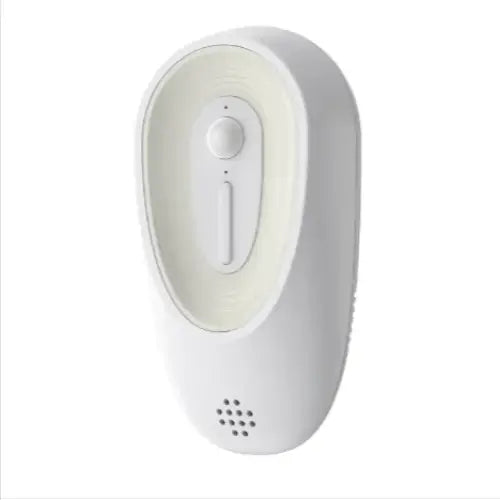 White plastic nightlight with a smooth, rounded design and an oval-shaped control panel featuring a central button.