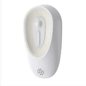 White plastic nightlight with a smooth, rounded design and an oval-shaped control panel featuring a central button.