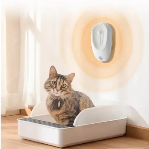 White wall-mounted cat litter box sensor