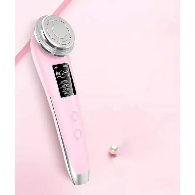 Pink and silver facial treatment device with a circular metallic head and digital display.