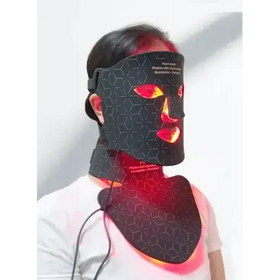 Black hexagonal-patterned facial mask with glowing red led lights illuminating the eyes, nose, and lips.