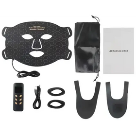 Black hexagonal-patterned led facial mask with cutouts for eyes, nose, and mouth.