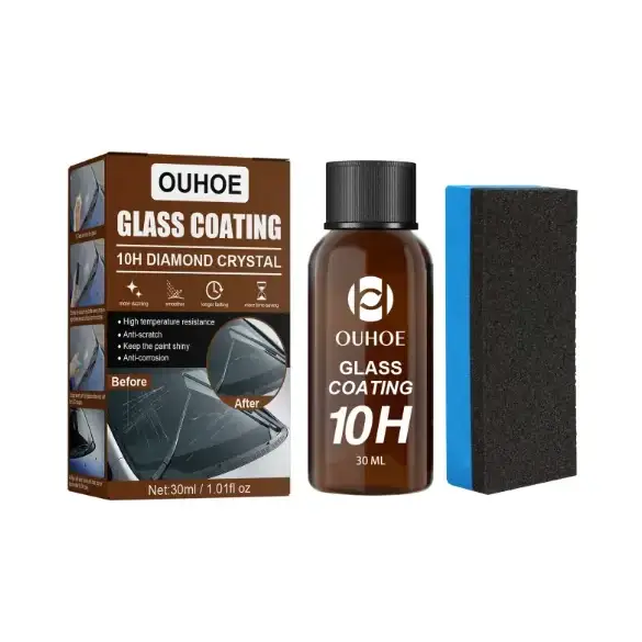 Ouhooe 10h diamond crystal glass coating in a brown bottle with black cap, accompanied by a blue and black sponge.