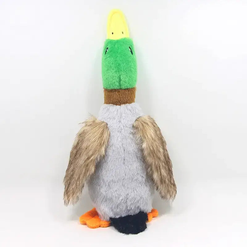 Plush mallard duck toy with green head, yellow beak, brown neck, gray body, and orange feet.